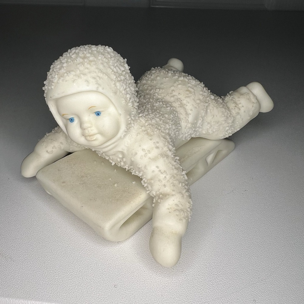 Department 56 Snowbabies figurine, titled "Hold On Tight"
